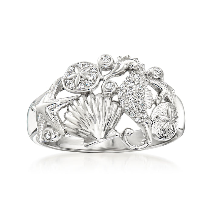 Sterling silver sea life diamond ring with shell design and round stones, side view