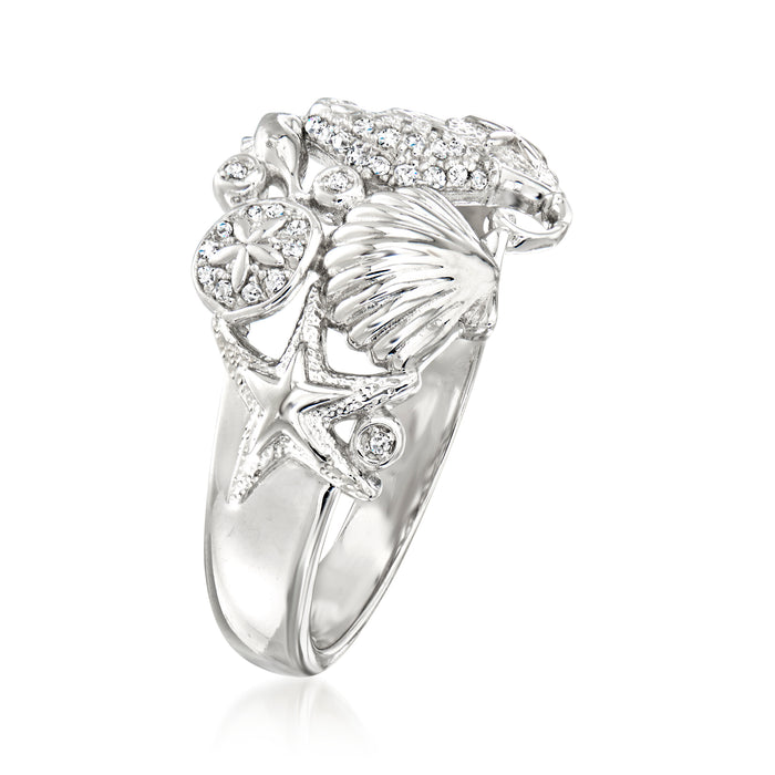 Sterling silver sea life diamond ring with shell and starfish charms, top view