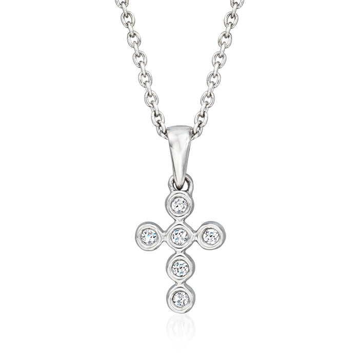 Sterling silver cross pendant necklace with round bezel-set stones on a chain