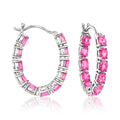 Sterling silver hoop earrings with pink topaz inside-and-out side stones