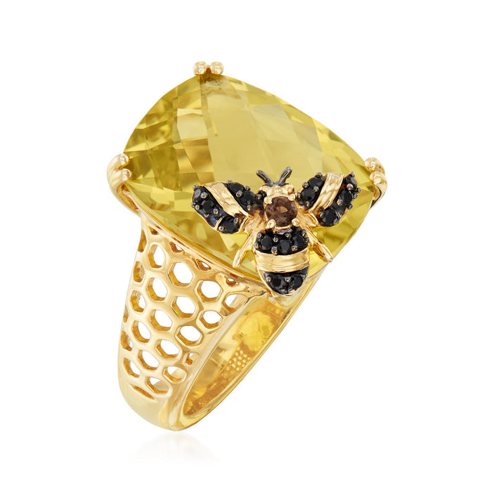 Gold-tone bee style ring with lemon-yellow center stone and lattice openwork band