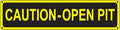 Yellow and black caution sign reading CAUTION-OPEN PIT for safety warning