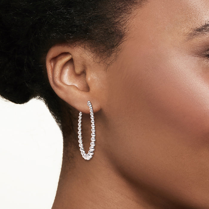 Sterling silver bead hoop earrings on ear, small round linked beads, post back