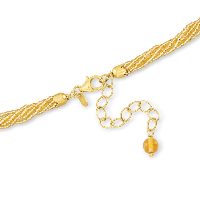 Turquoise starfish necklace clasp and gold-tone chain with glass bead accent