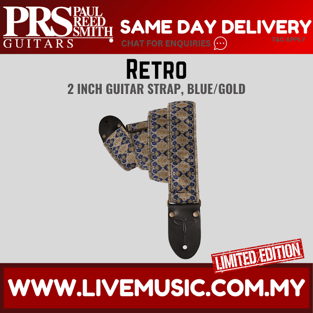 Retro 2-inch guitar strap with blue patterned fabric and black leather ends, brass studs