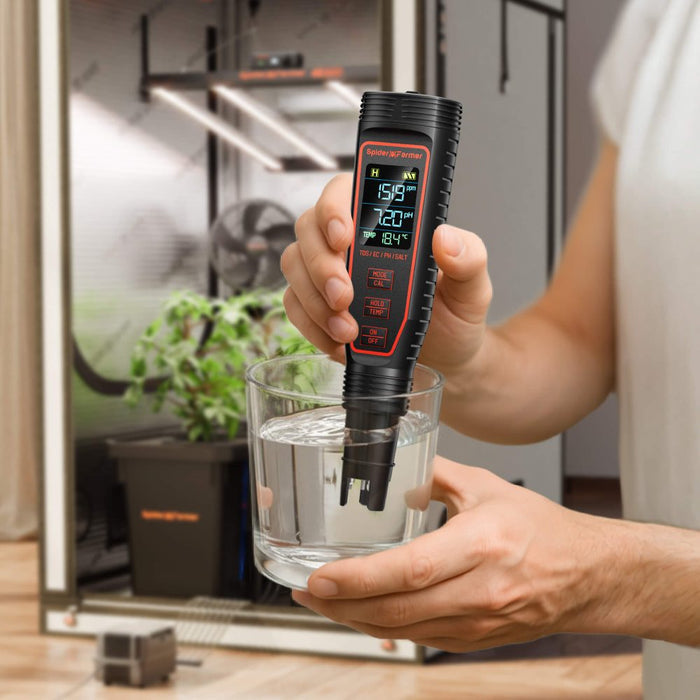 Spider Farmer 5-in-1 pH meter in use testing a hydroponic reservoir