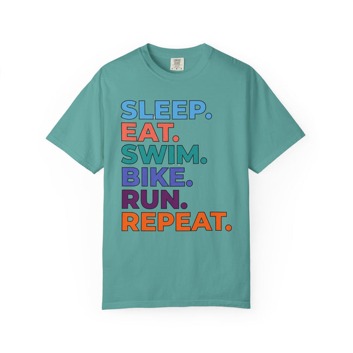 Triathlon Routine T-Shirt — "Sleep. Eat. Swim. Bike. Run. Repeat." Motivational Athletic Tee