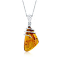 Sterling silver amber wrapped teardrop pendant necklace with reflective chain